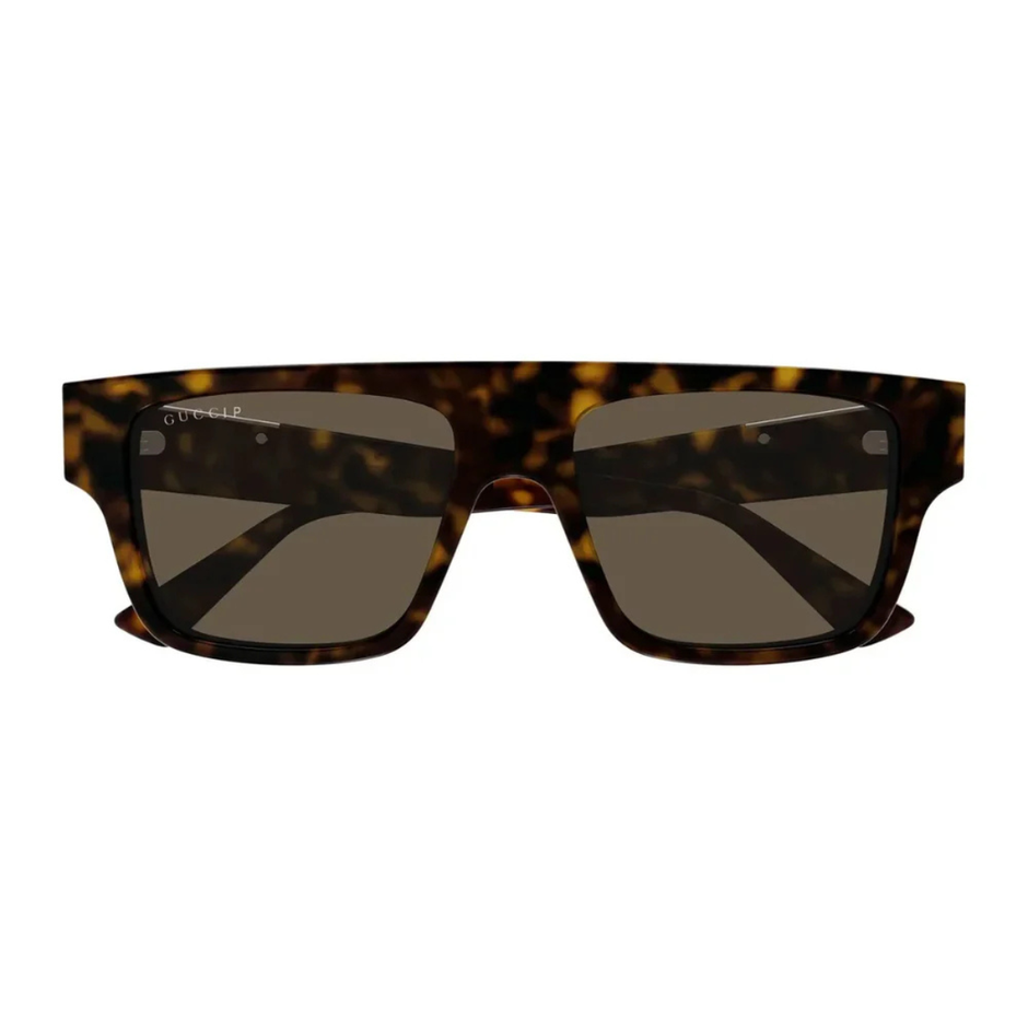 Sunglasses with tortoiseshell frame and dark lenses on a white background
